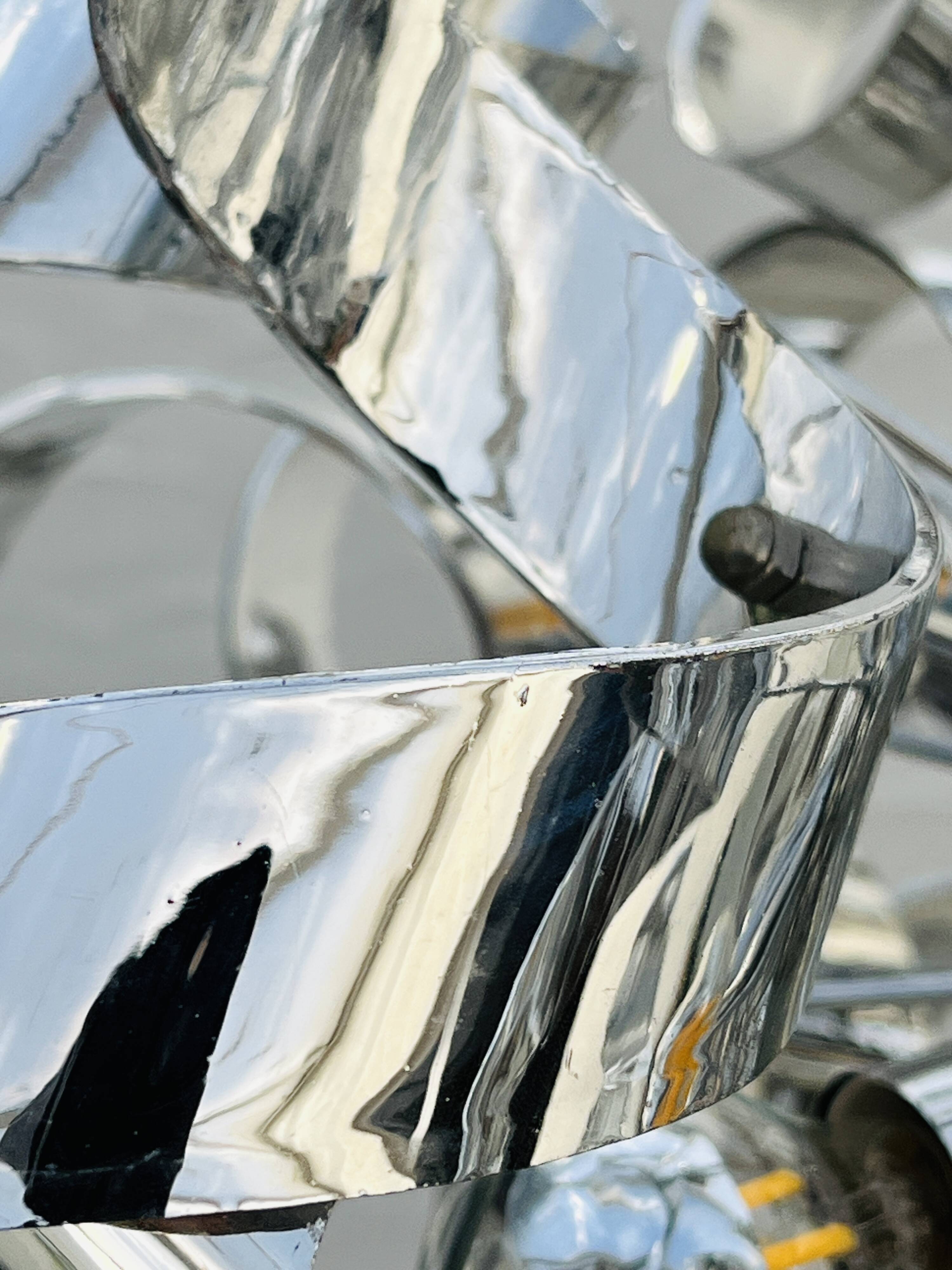 Sculptural chrome suspension design