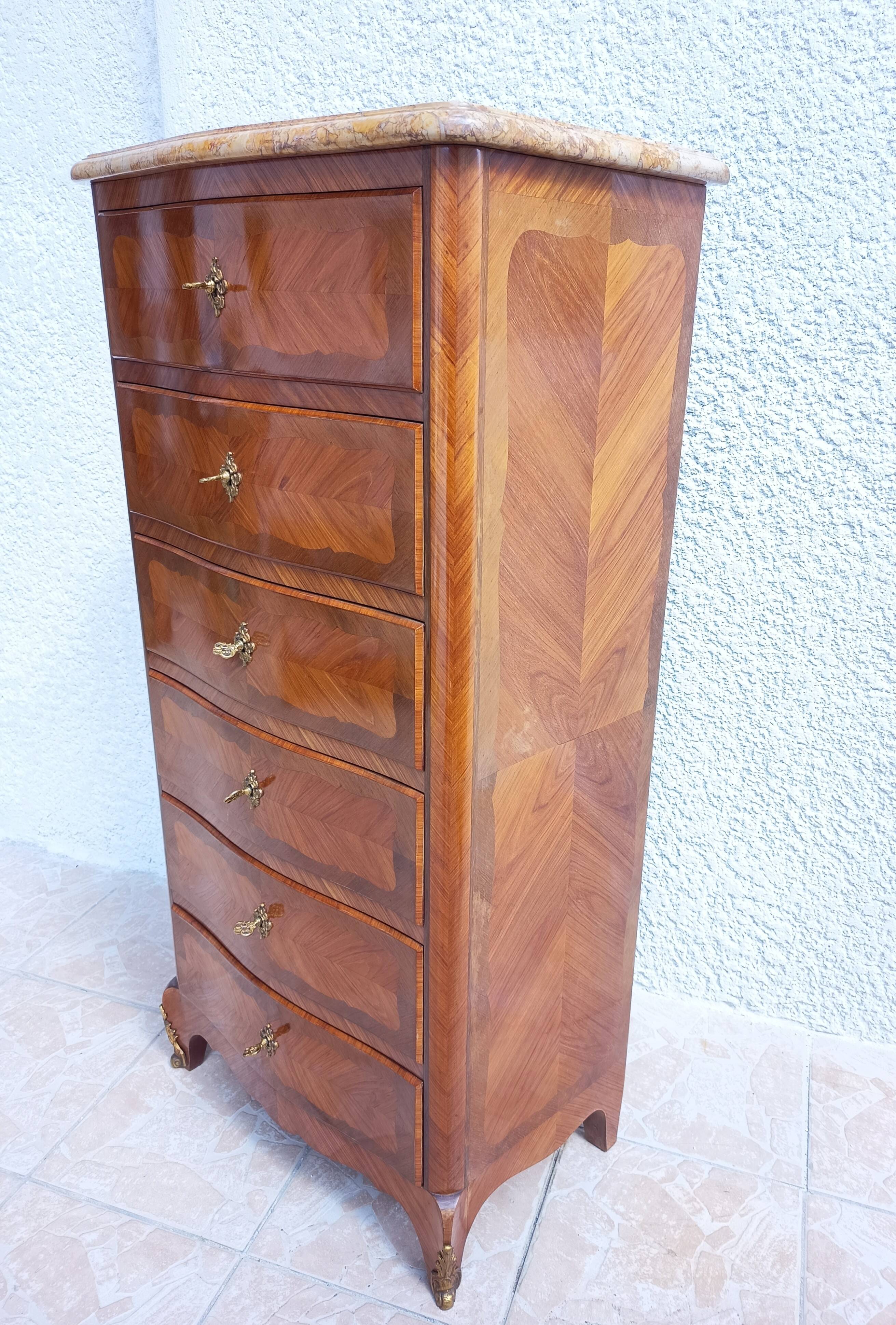 Louis XV style chest of drawers in precious wood veneer.