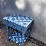 Blue checkered bedside table, neo-vintage style, turned legs.