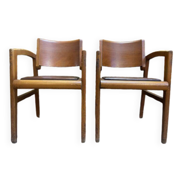 Paire de fauteuils en bois et cuir, années 1950