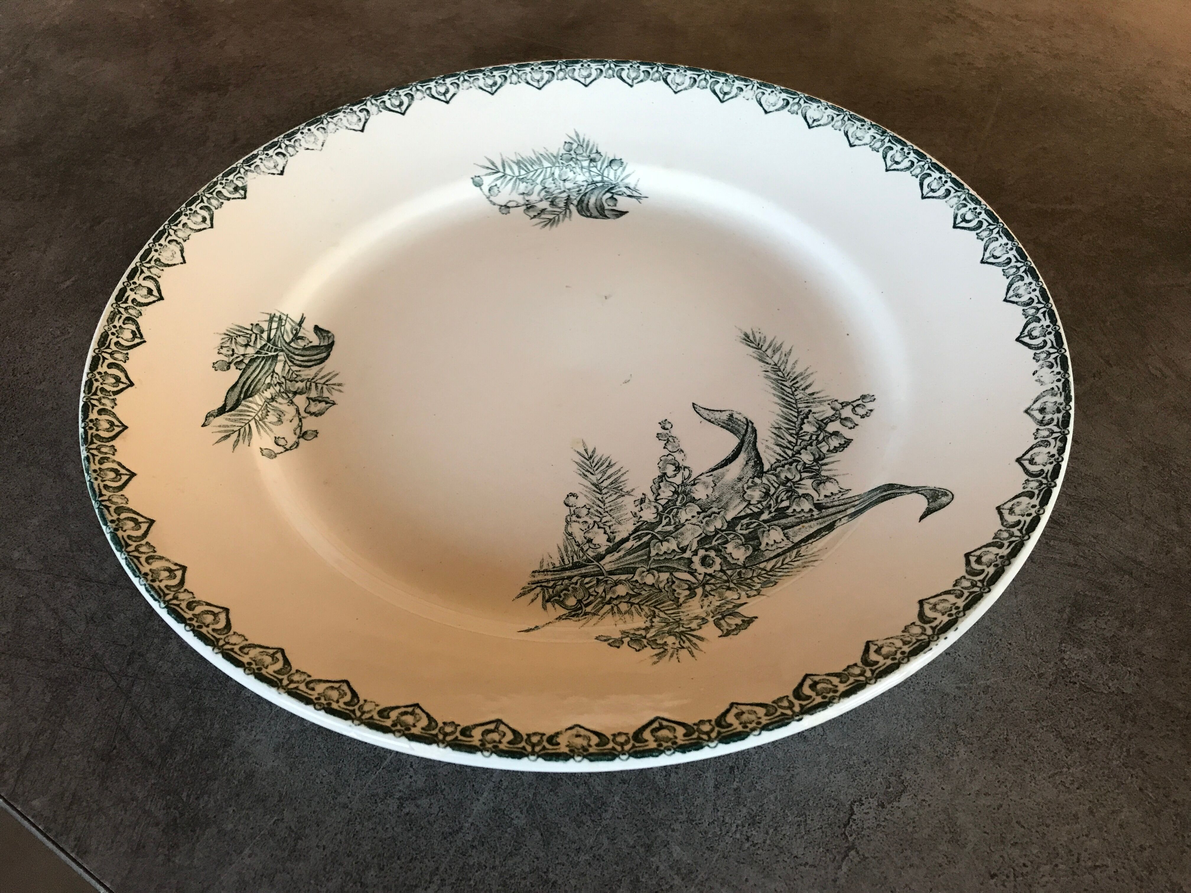 Flat hollow in earthenware st amandinoise st amand model lily of the valley