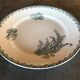 Flat hollow in earthenware st amandinoise st amand model lily of the valley