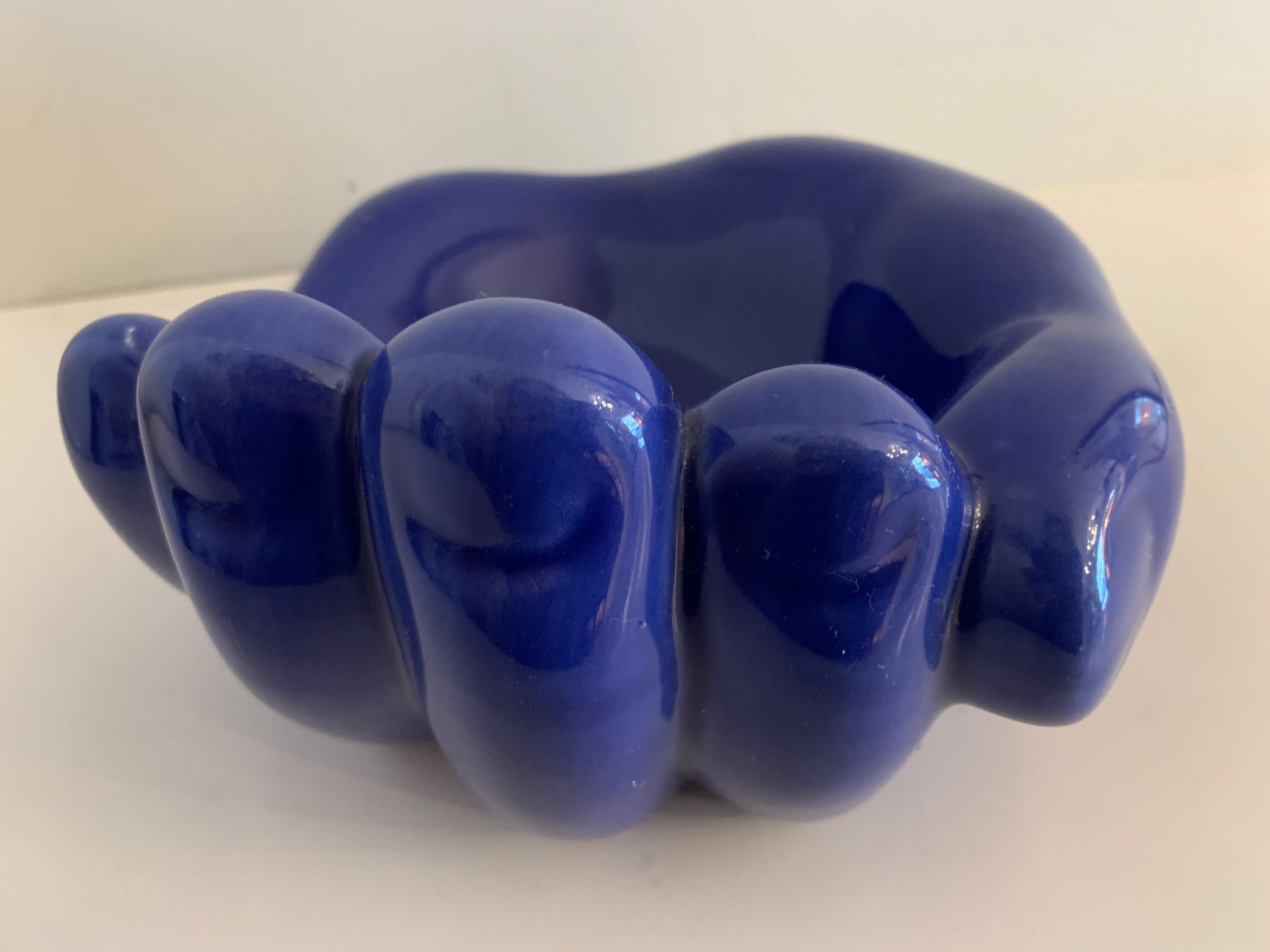 Ceramic ashtray, blue hand shape
