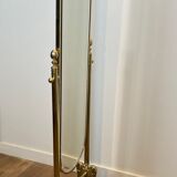 Pair of brass cheval mirrors in neoclassical style