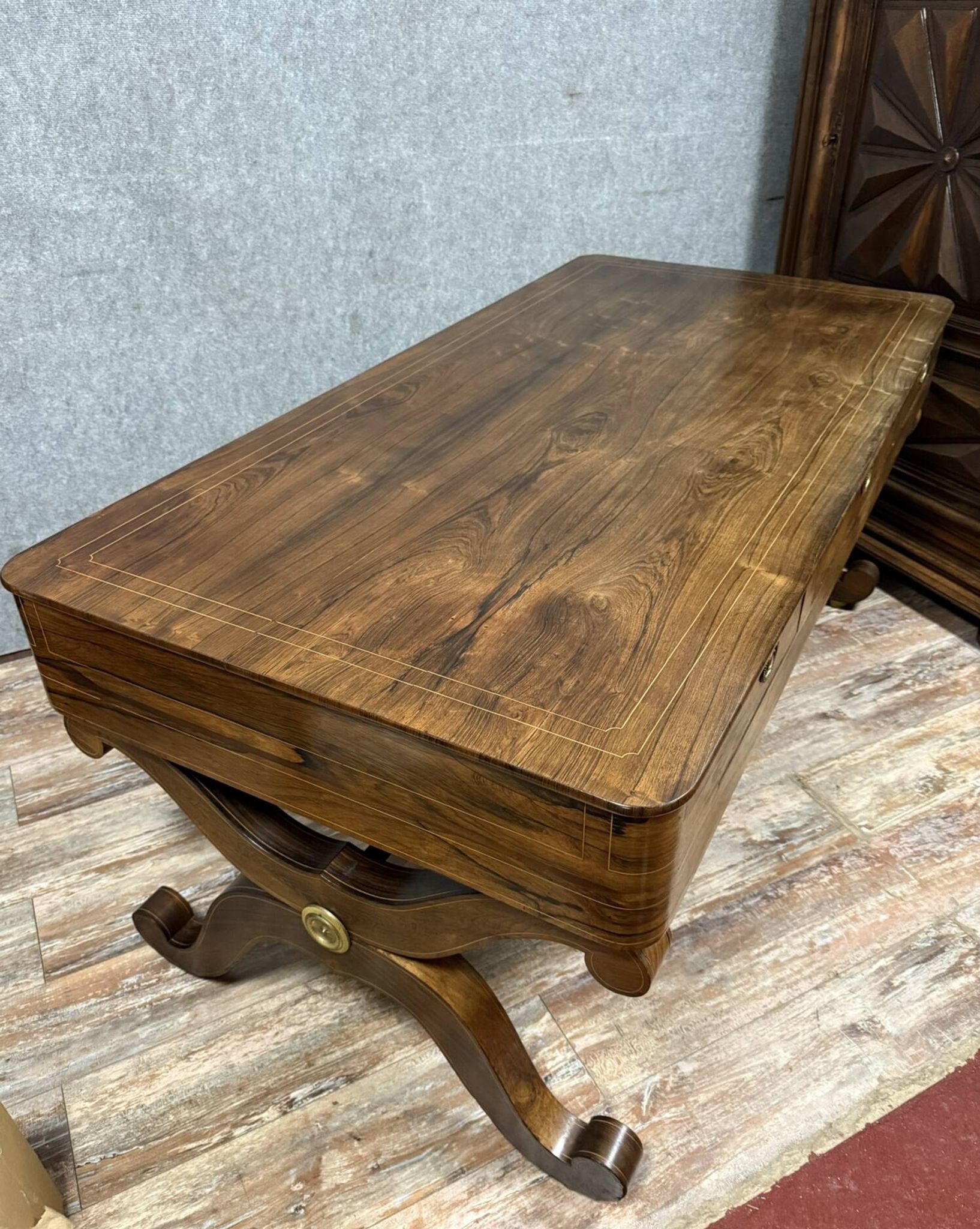 Very large Charles X period center desk in rosewood and lemonwood