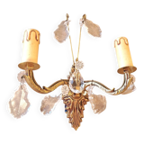 Gold wall light with tassel