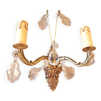 Gold wall light with tassel