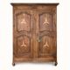 Antique French rustic wardrobe with star inlays.