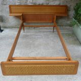 Wooden bed and rattan