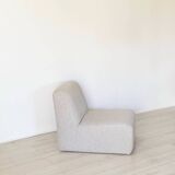 3 gray foam armchairs