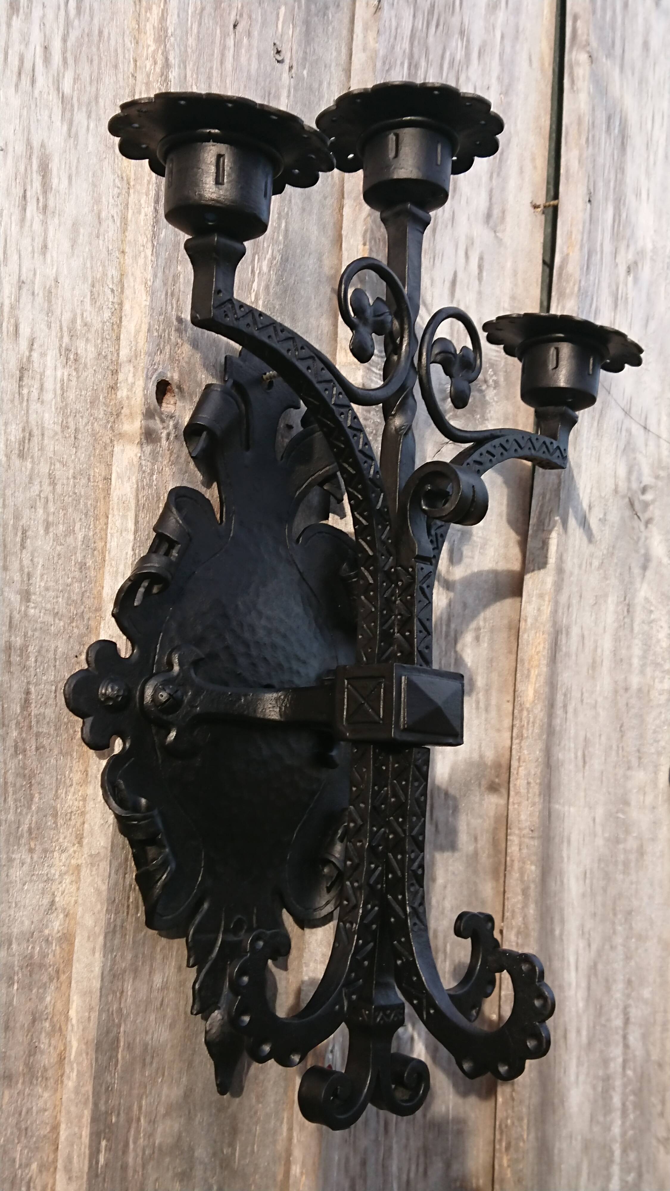 Pair of black wrought iron sconces - neo-Gothic style - from the 1950s