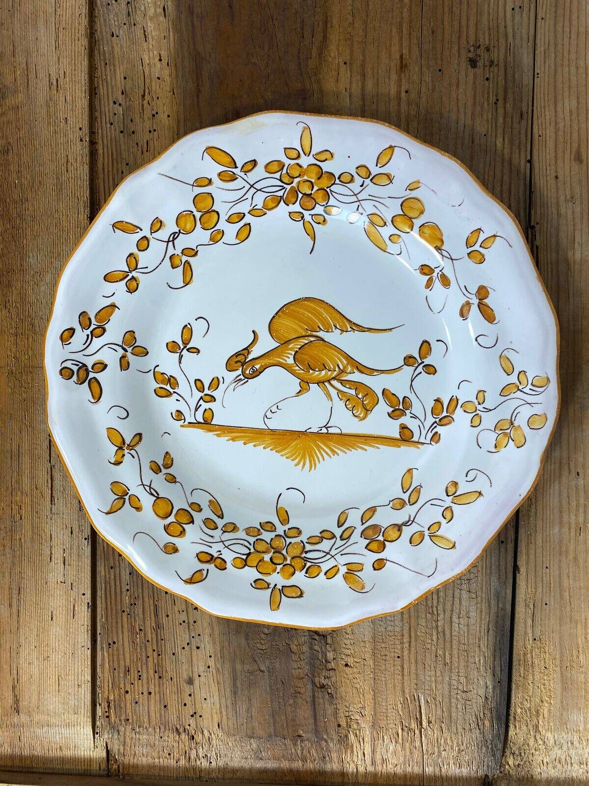 Set of 6 earthenware plates from Moustiers, featuring birds and flowers.