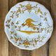 Set of 6 earthenware plates from Moustiers, featuring birds and flowers.