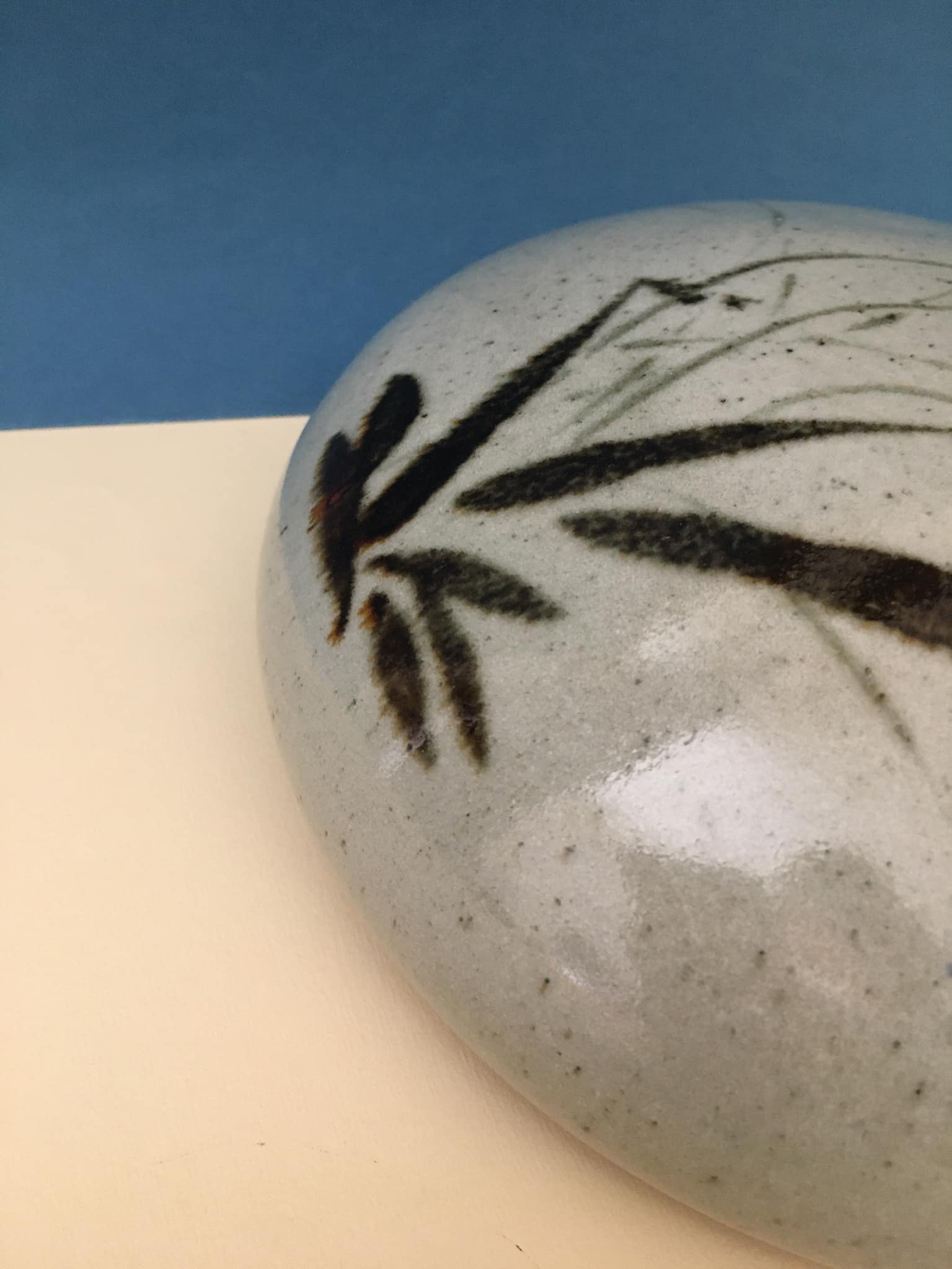 Ceramic wall plant holder with floral motifs, unknown signature