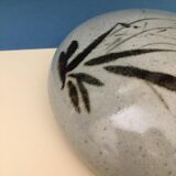Ceramic wall plant holder with unknown signature floral patterns