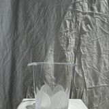 Glass ice or champagne bucket with stylized petal patterns