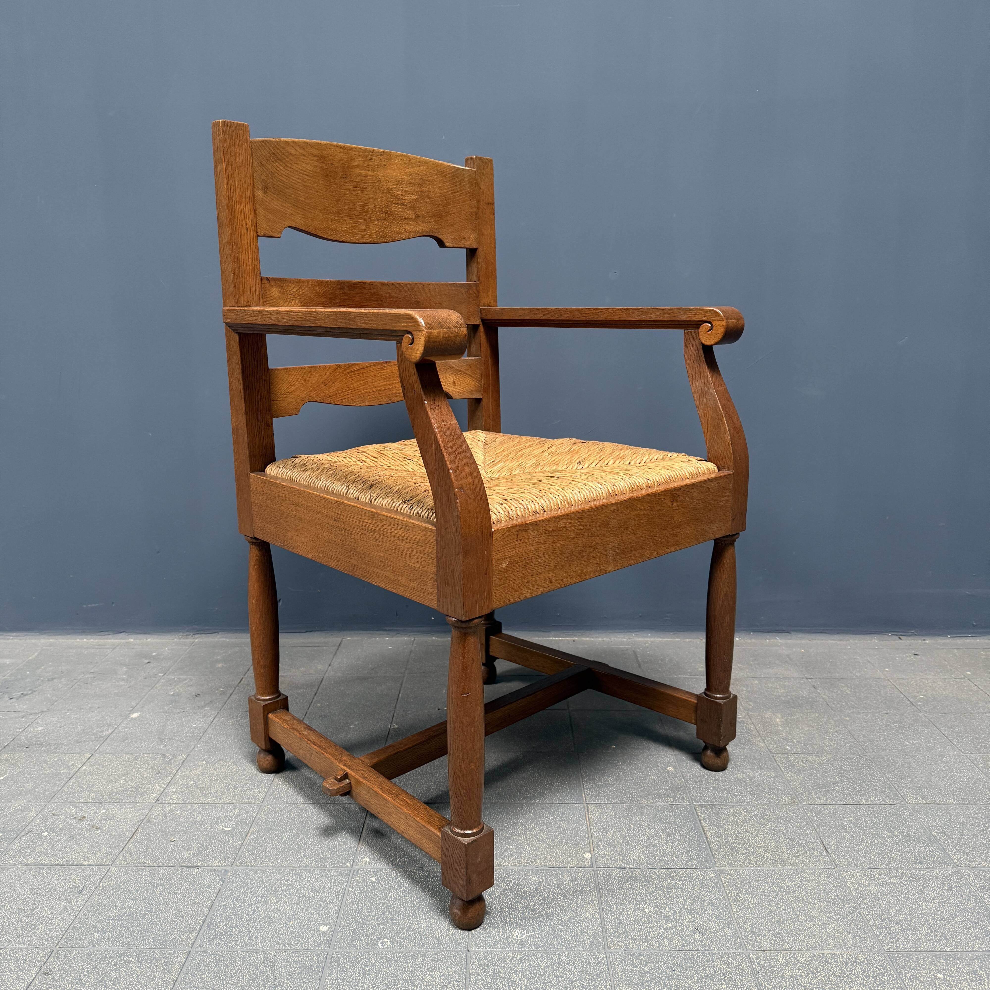 Set of two Dutch oak armchairs with rush seats