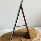 Miroir ancien ciselé en biseau