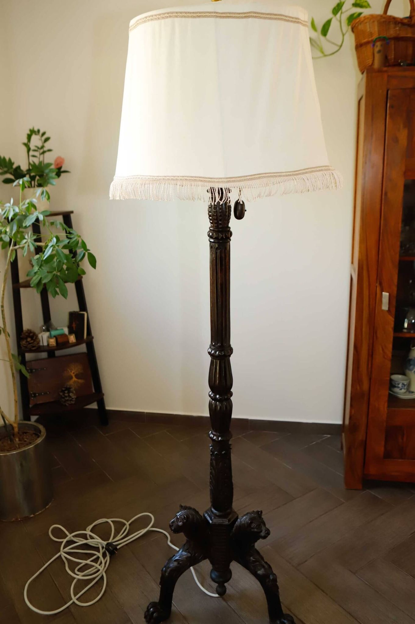 Antique floor lamp with lion motif
