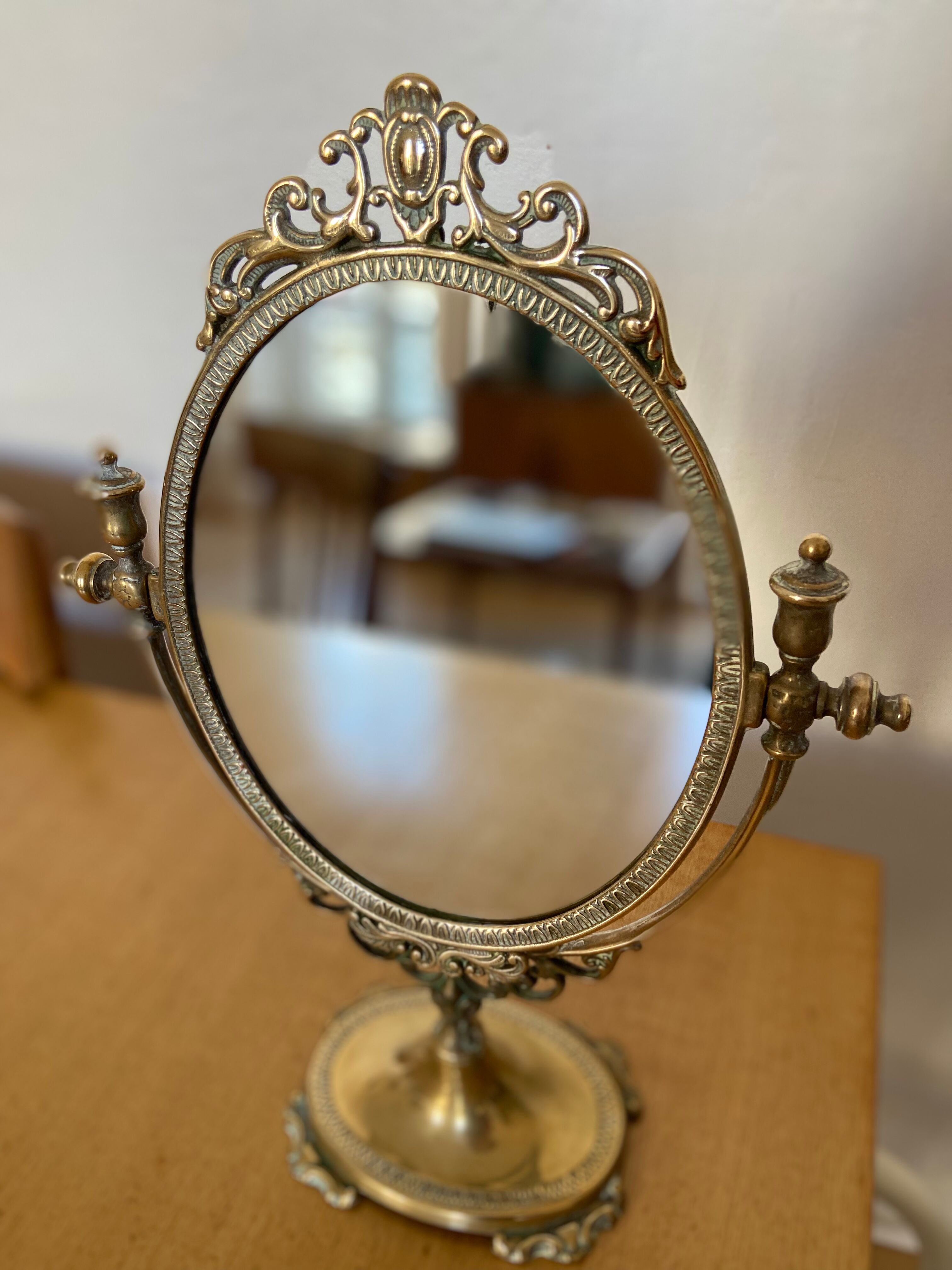 Psyche mirror, early XX th in golden brass