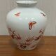 Vase decorated with birds and butterflies