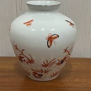 Vase decorated with birds and butterflies