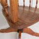 Oak office chair with a spring system and height adjustable, 1930s.