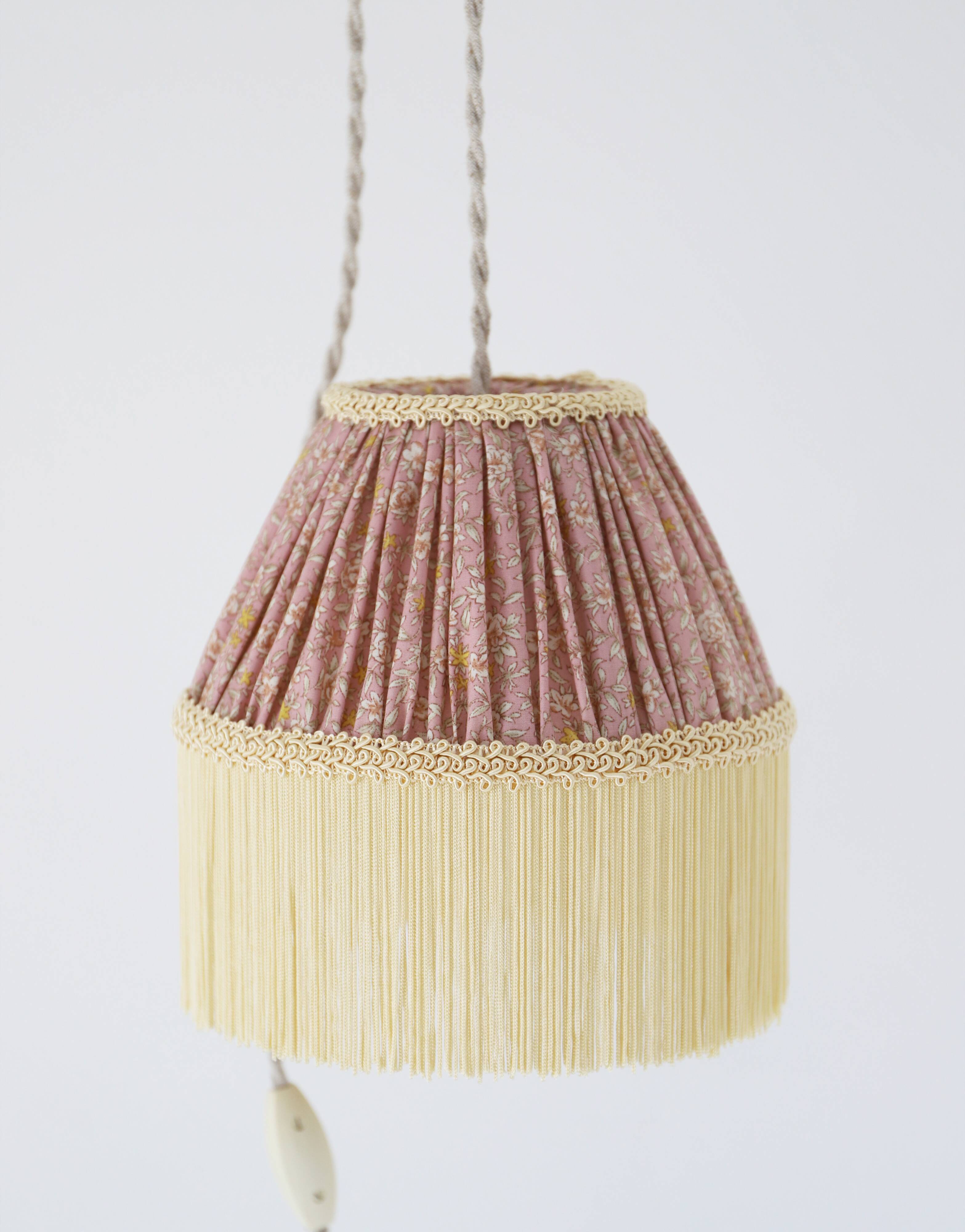 Small floral portable lamp with fringed finish