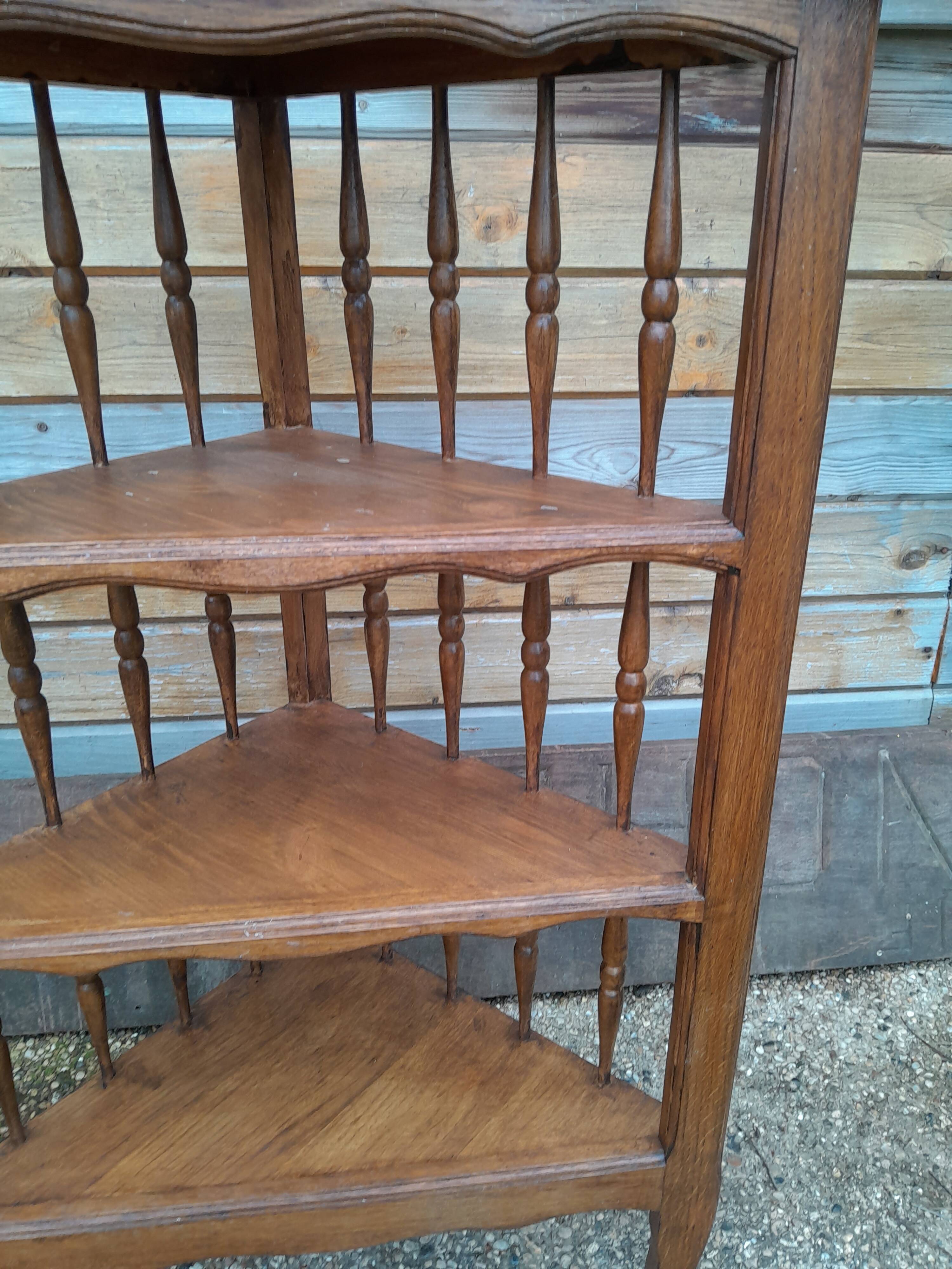 Old wooden corner shelf unit