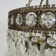 Old chandelier in bronze or silver brass, 4 lights, crystal grapevines. Year 60 70