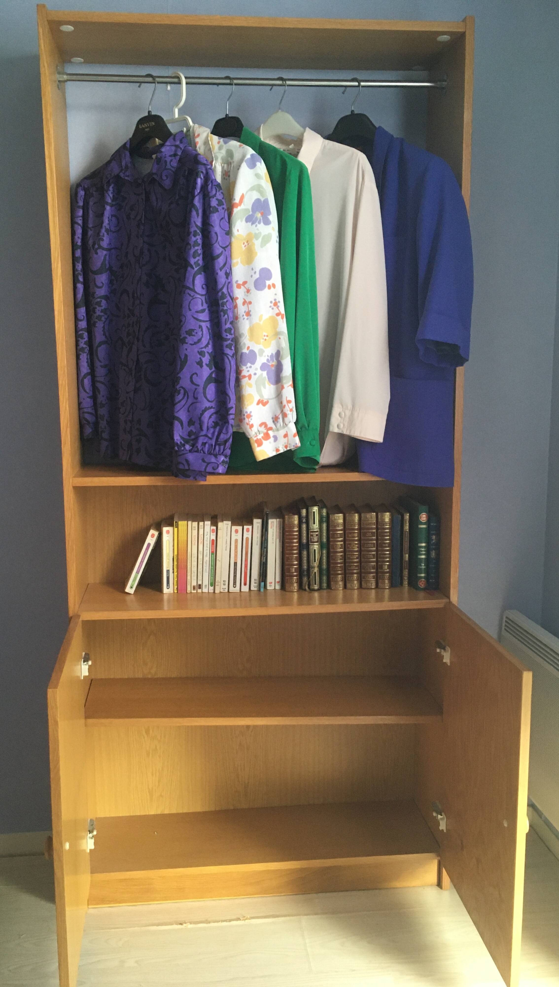 Dressing vintage Scandinavian style in light wood with wardrobe and cupboard.