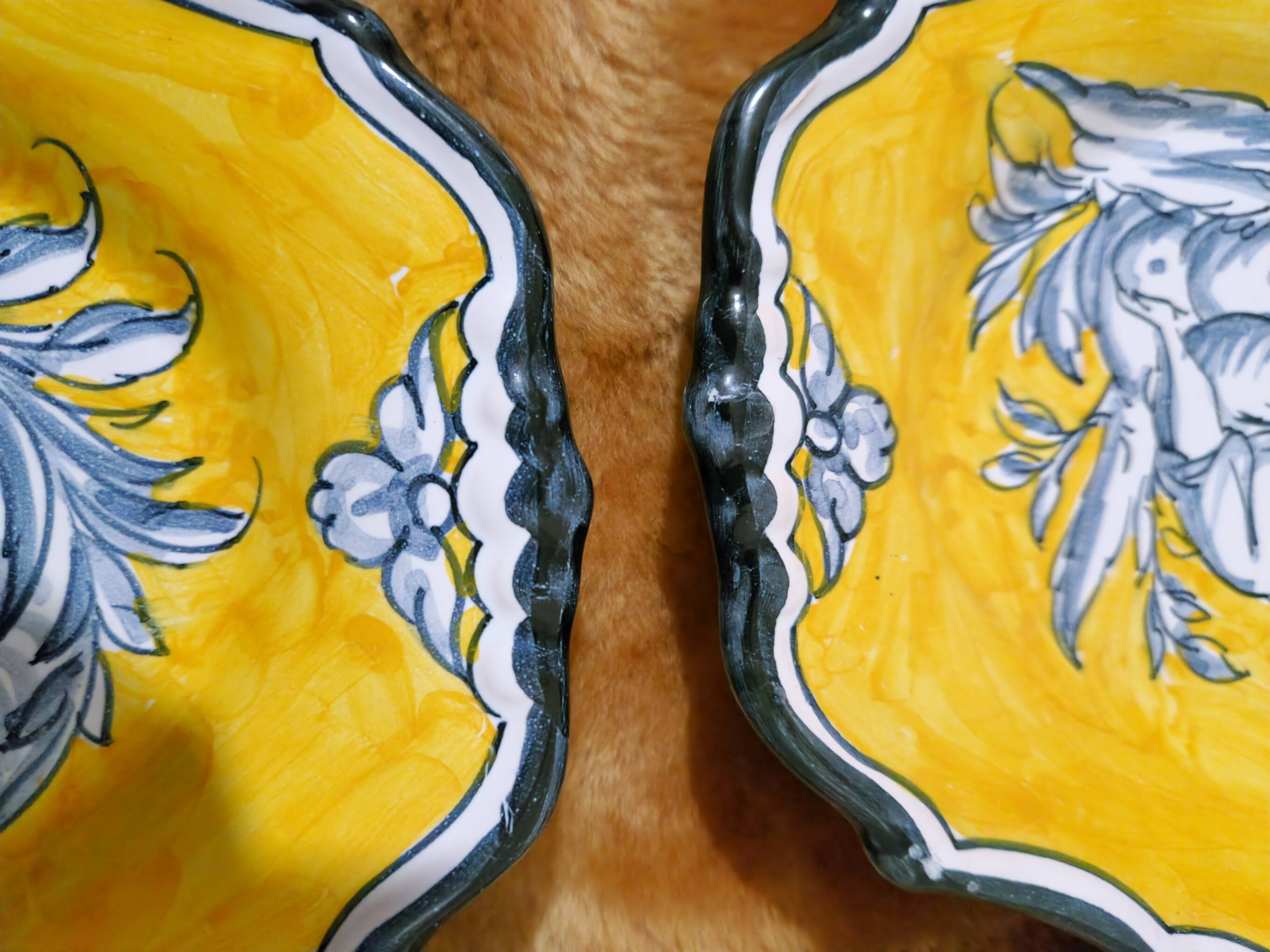 Pair of oval dishes in hand-painted faience with an Italian majolica spirit.