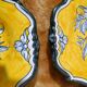 Pair of oval dishes in hand-painted faience with an Italian majolica spirit.