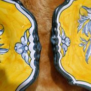 Pair of oval dishes in hand-painted faience with an Italian majolica spirit.