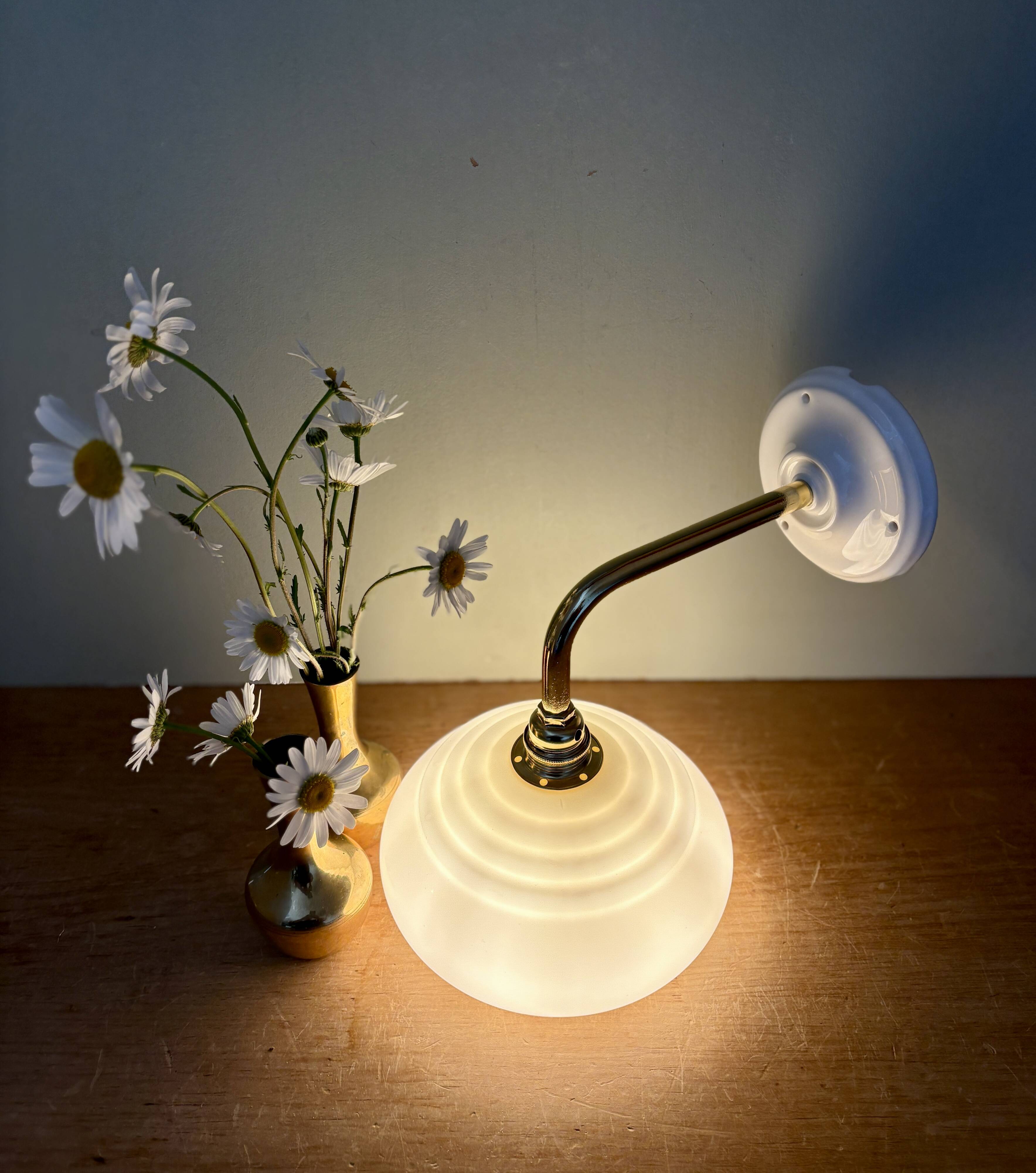 Vintage angled wall lamp with pale yellow opaline shade
