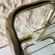 Glass and brass side table with magazine rack, circa 1970's