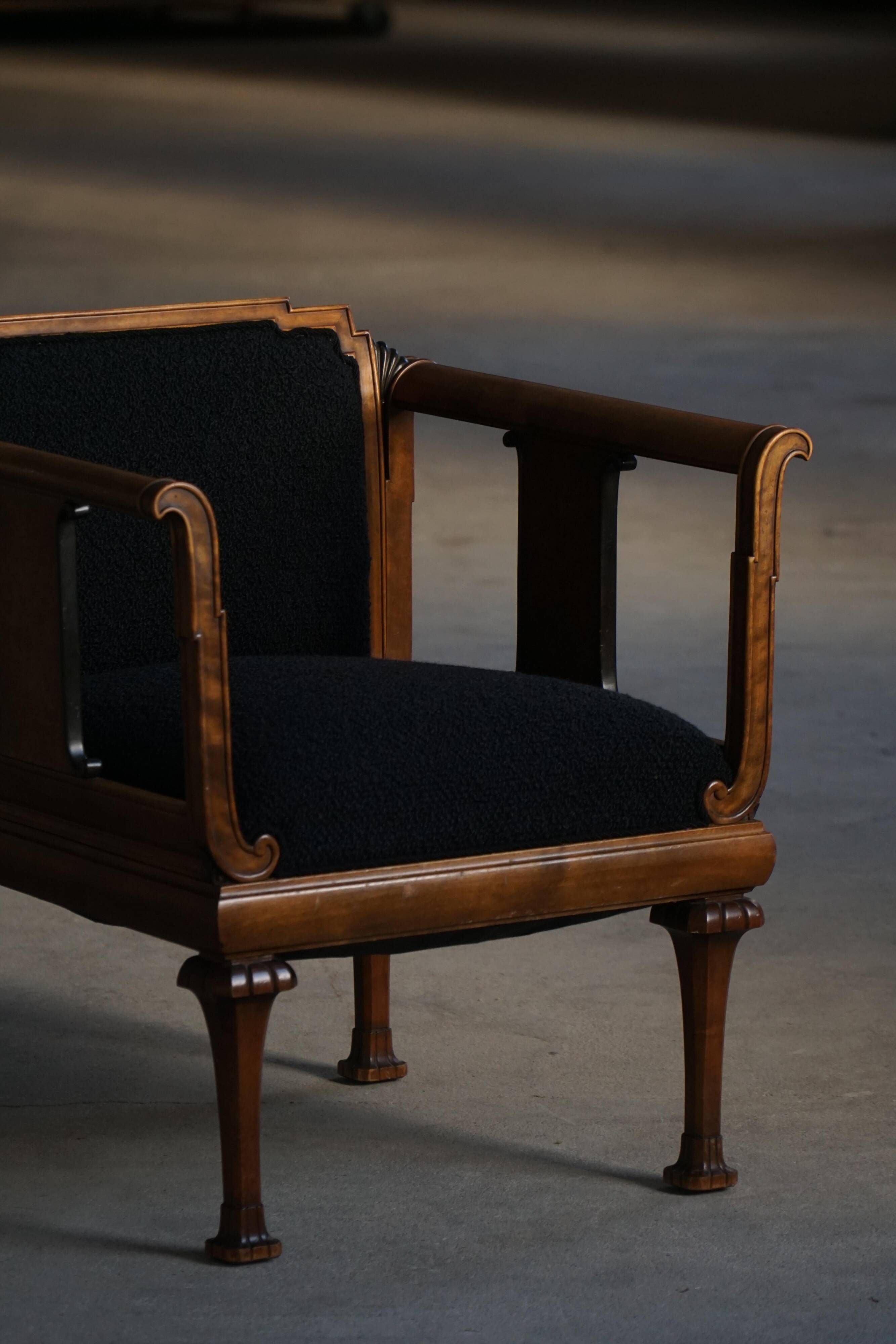 Early 20th century Danish Art Nouveau armchair, reupholstered in charcoal boucle.