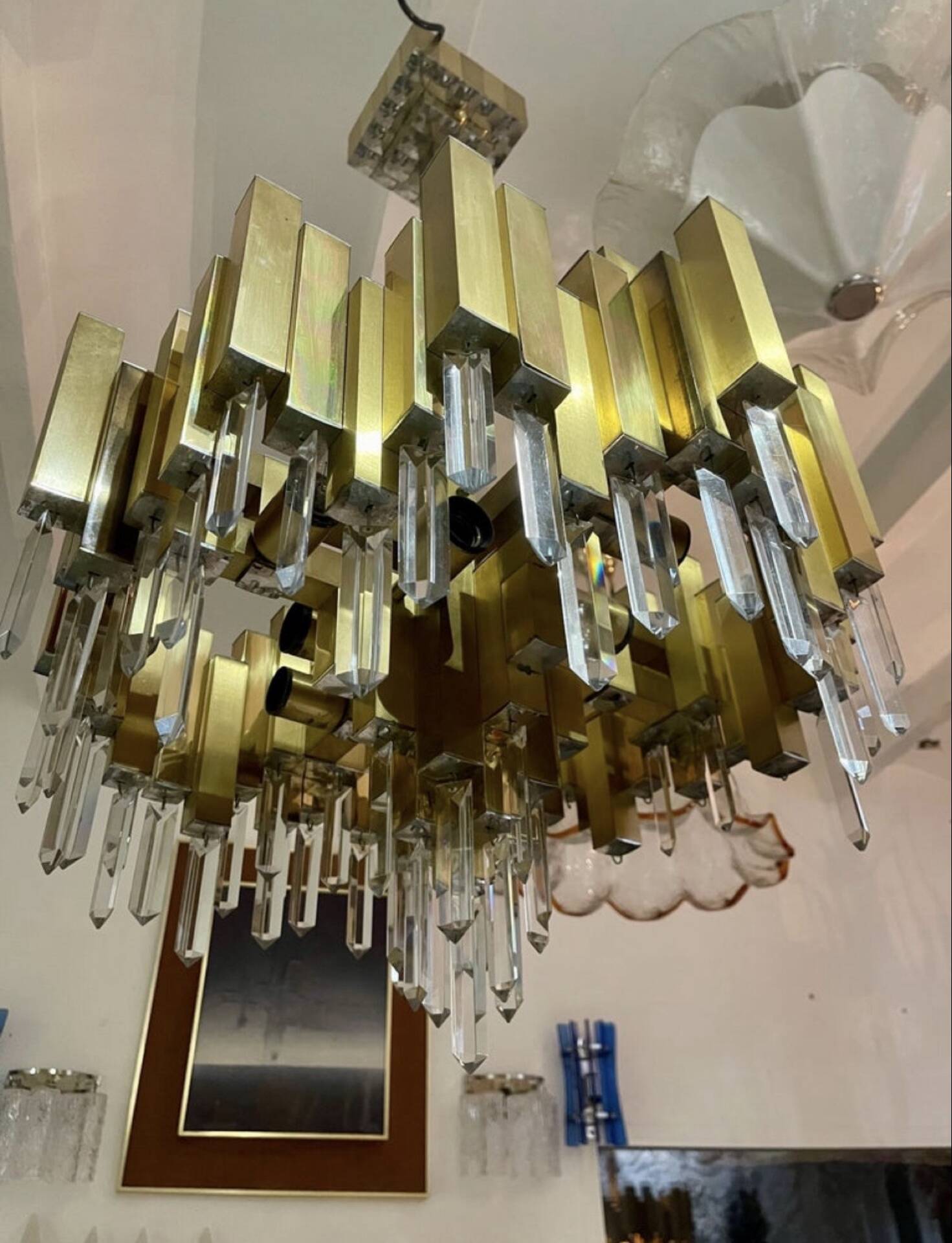 Rare 1970s Lumica chandelier in brass and crystal.