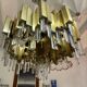 Rare 1970s Lumica chandelier in brass and crystal.