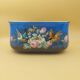 Paris porcelain jardinière with floral and bird decoration, 19th century.