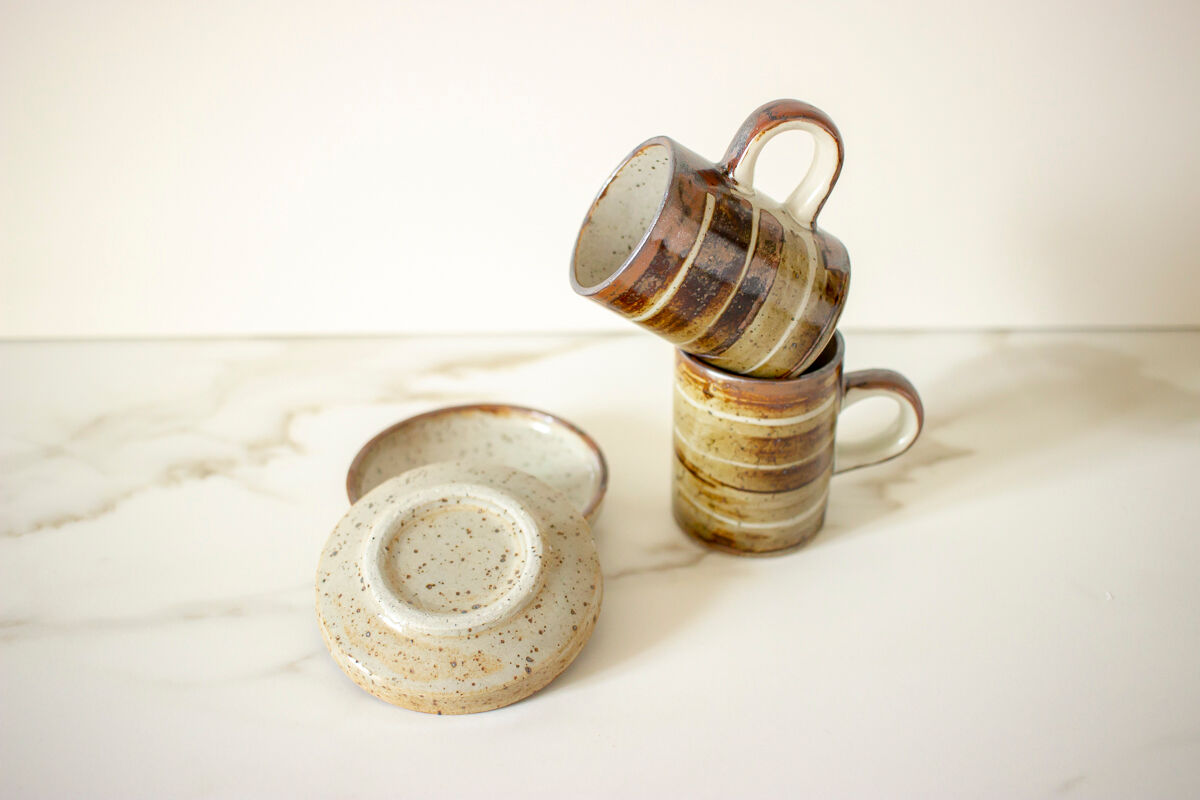 Pair of stoneware cups and sub-cups