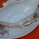 Sauce boat on dormant white porcelain, floral decoration