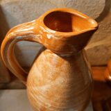 Duo of pitchers water, wine