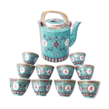 Chinese porcelain tea service with wicker basket