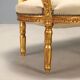 Neoclassical canapé in gilded wood