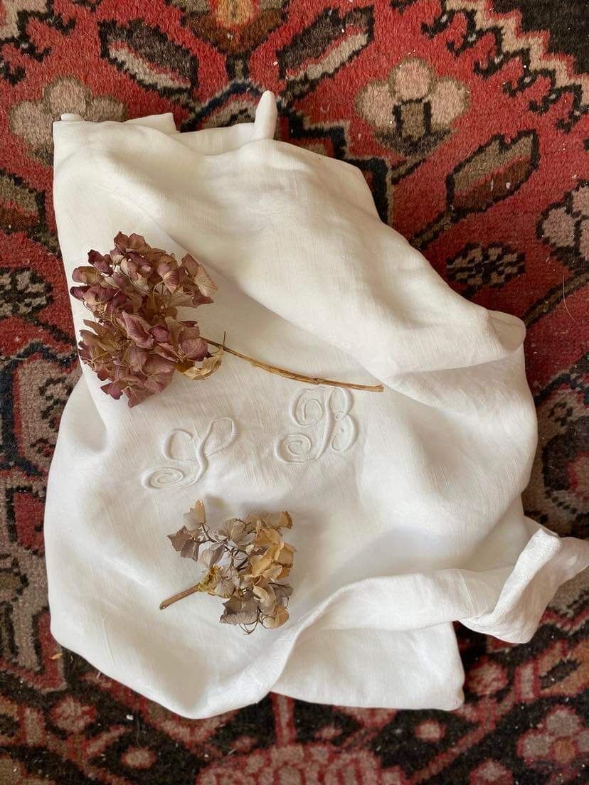 Old tablecloth in white cotton and monogram