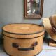 Hat box with leather handle