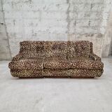 Vintage sofa in leopard fabric