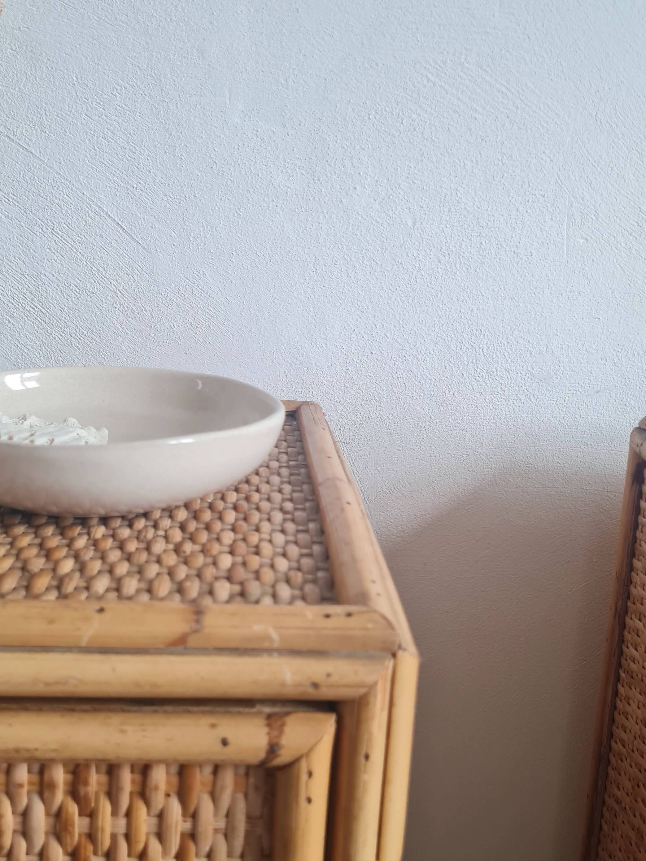 Pair of rattan bedside tables circa the 1970s.