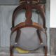 Barber chair in wood and leather with adjustable headrest, office chair.